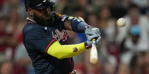 Braves blow 8-run lead, but Ozuna’s sacrifice fly in 10th prompts win vs. Reds