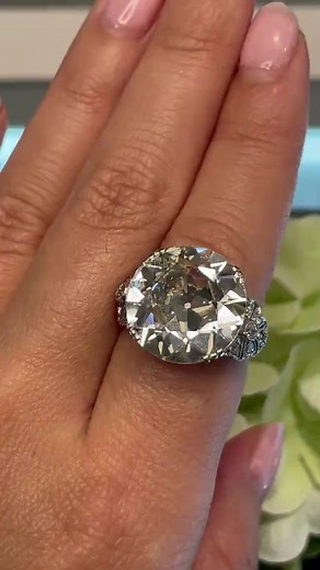 This vintage, old European cut diamond weighs 10.51 carats and has been graded N color and VS2 clarity by GIA. The old European cut evolved during the 19th century and features a smaller table, higher crown, and larger facets. These distinctive proportions maximize a diamond's fire, particularly in candlelight settings, and give diamonds a “chunkier” pattern of light instead of the smaller, more distributed light and dark pattern of modern brilliant cuts. If you're searching for an engagement ri