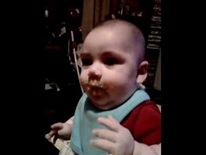 Hungry baby. First time eating real foods.