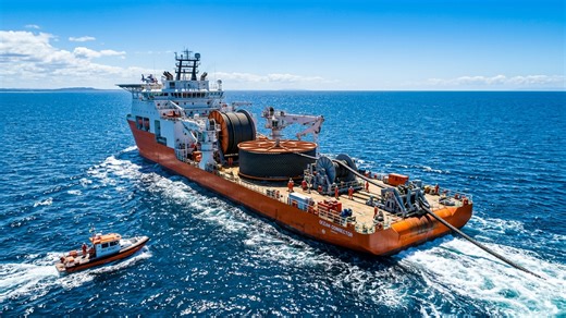 How ships lay fiber optic cables across the ocean floor, plows, ROVs, and the repair process explained