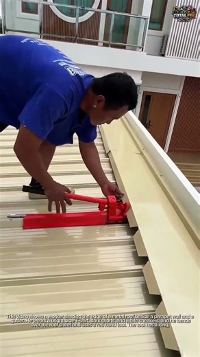 How a Roofer Uses a Hand Seaming Tool to Bend and Shape Metal Roof Sheets Along a Gutter Edge 🏗️