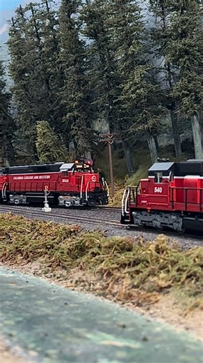“Mountain Goat” Greg Baker | A trio of new GP units lead the trailer train uphill past a train in the siding a Granite Mountain. Filmed on the HO scale CC&W layout... | Instagram