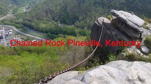 Did you know about the CHAINED ROCK protecting Pineville, Kentucky? In southeastern Kentucky's Bell County, high on the vaulted slopes of Pine Mountain a large rock outcropping looms menacingly over the small town of Pineville. For years Chained Rock had been a part of area mountain folklore. But, in the 1930's it became a genuine legend when a feat of the newly formed Chained Rock Club was reported in countless newspapers across the country. As the legend goes, the town's children had for years