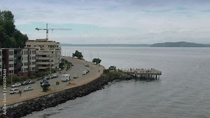 Aerial: Alki Beach front and apartments. Seattle, Washington, USA