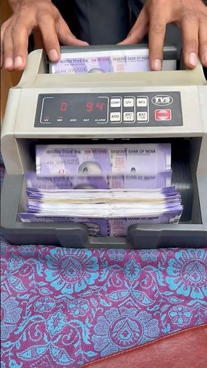 Counting 100-rupees cash 💴