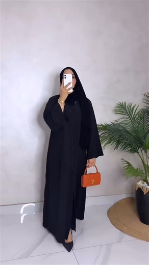 Kiswa Collections on Instagram: "Exquisitely tailored in premium linen, finished with elegant sequin embroidery for a refined, luxurious look ✨ A statement of modest elegance. it’s a statement of poise and individuality. Because true style lies in simplicity, and luxury lives in the details. Step into elegance. Step into KISWA. Model @amber.chanda 🖤 Premium Linen abaya with elegant sequin work 📞 +971 50 564 4249 🌐 www.kiswacollections.com #KiswaCollection #NadaAbaya #PremiumAbaya #SequinWork