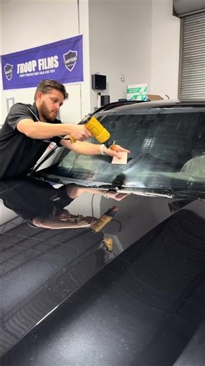 Heat shrinking full front windshield tint on 2024 BMW X5 #bmw #tint #charleston