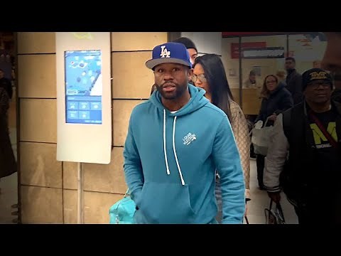 Floyd Mayweather Jr. And Girlfriend Navigate Fan Frenzy At Paris Train Station