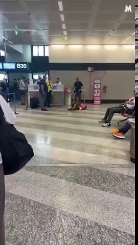 Adult passenger meltdown caught on camera as she throws tantrum at airport gate