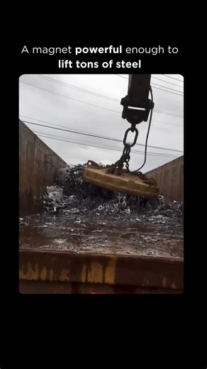 AI | Technology | Business on Instagram: "It looks like magic, but it’s pure physics at work. 🧲 Industrial lifting magnets use electricity to generate powerful electromagnetic fields inside tightly wound coils. When current flows, the field instantly attracts ferrous metals like steel, allowing operators to lift thousands of pounds of scrap in seconds ⚙️🏗️. Flip the switch off, and the magnetic field collapses, releasing the load cleanly and precisely. This on-demand control makes heavy liftin