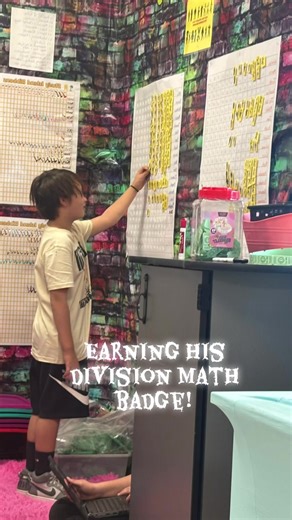 Earning his division Math badge! | math