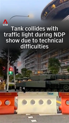 A tank collided with a traffic light along North Bridge Road during the Mobile Column segment of the National Day Parade 2025 National Education Show 2. The tank experienced a technical issue and MINDEF added that no personnel was injured during the incident. #singapore #singaporenews | CNA