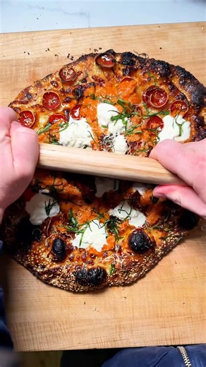Sean Sullivan on Instagram: "Friday pep came early with vodka sauce on top, cup-and-char pepperoni, and a crispy sesame-seeded sourdough crust—you can’t go wrong. Baked in my @gozney dome"