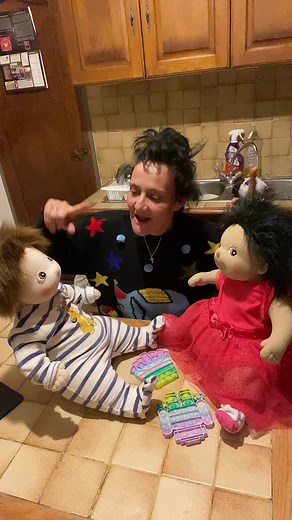 Engaging Playtime with Colorful Dolls in the Kitchen