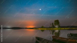 4K Braslaw District, Vitebsk Voblast, Belarus. Real Colorful Night Stars Above Braslav Braslau Lake. Natural Starry Sky Landscape Time lapse Time-lapse