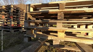 Forklift turning with stack of pallets