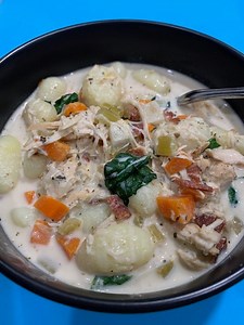 Comforting Crockpot Soup! Savory chicken gnocchi soup for the win. Cozy and delicious make this a perfect meal for this time of year. Have fun switching up the veggies in this yummy dish then grab a bowl, some crusty bread and enjoy. #dinner #soup #chicken #italianfood | Scott & Karen