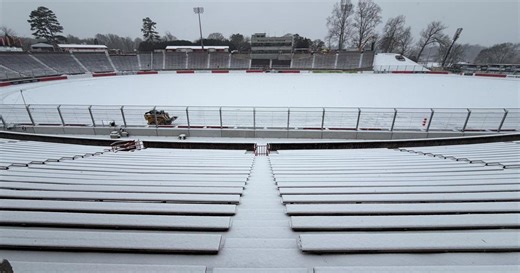 NASCAR postpones Sunday night's race because of snow, but will try again on Monday