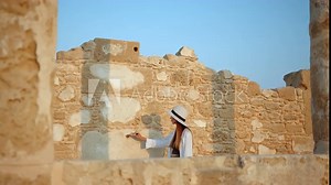 Archaeological Digging Site: Great Female Archeologist Work on Excavation Site, Cleaning Cultural Artifacts with Brush and Tools. Discovery of Ancient Civilization Temple, Architecture, Fossil Remains