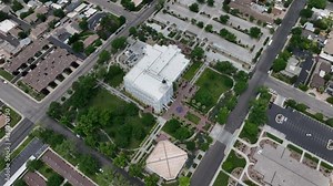 Aerial St George Utah LDS Temple full circle 5. Southwestern desert. Pioneer temple in residential area built in 1877. First LDS temple in Utah. The Church of Jesus Christ of Latter-day Saints.