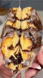 these viral brownie cinnamon rolls just changed the whole cinnamon roll game 🍫🥮 Ingredients: 1 can @pillsbury Grands! cinnamon rolls 1 box fudge brownie mix 2 eggs 1/2 cup vegetable oil Instructions: On a floured parchment paper sheet, roll out full can of cinnamon roll dough. In a large mixing bowl, prepare brownie mix with eggs ans vegetable oil (NO WATER) and pour a thin layer over the cinnamon roll dough. Spread to coat evenly. Roll cinnamon rolls back into their original shape with the br