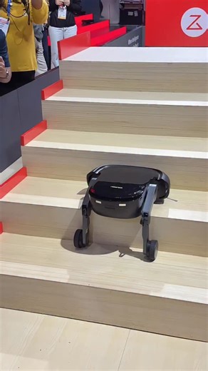 We just saw the world’s first robot vacuum with legs at CES 2026. 🦿💥 This device features built-in AI that allows it to control its legs independently to navigate around obstacles. It can climb stairs to reach every level of your home and cleans the steps as it goes. The legs even allow it to perform cute little hops over thresholds. 🏠✨ #CES2026 #RobotVacuum #RoborockSarosRover #Innovation #Robotics | PCMag