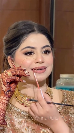 Amna Rafiq on Instagram: "One of my oldest clients & most genuine person I’ve ever across!❤️ My dear @noorayyslay ❤️ Brides, karachi, Pakistan, fun, reels, bride hacks, nose ring, best mua, Amna Rafiq, glitter, Pakistani makeup, dulhan, shalima, glam, makeup, noor, getting ready session"