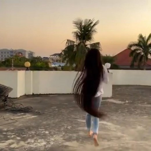 Very long haired girl running