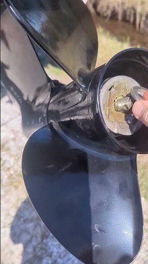 Installing the propeller on a Suzuki DF 90A outboard. Getting ready for boat season!