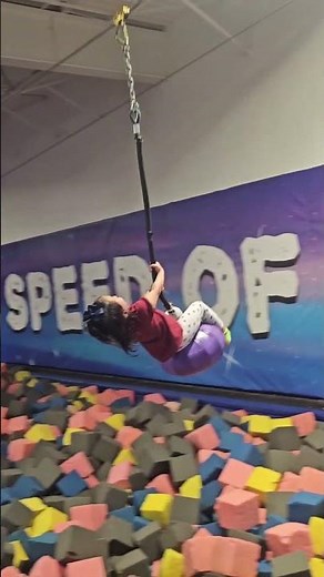 Foam Pit Fun: Smiling, Swinging, and Epic Flips!