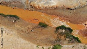 Apocalyptic fantastic background, aerial video. Global worming concept - dry soil, drought, desert landscape, red water. Post-apocalyptic view. Man-made disasters. Natural catastrophes.