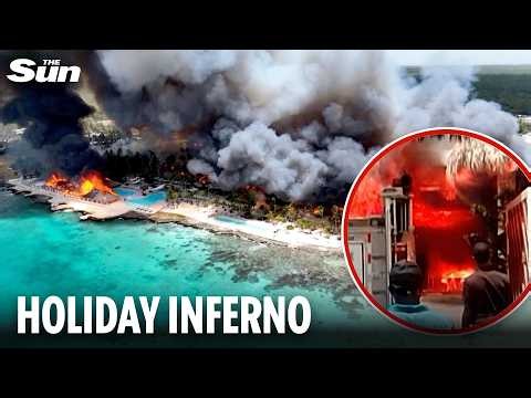 Tourist dies after fire rips through luxury beach resort as 1,700 holidaymakers forced to evacuate