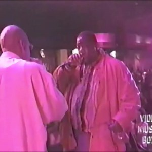 In 1996, Notorious B.I.G. and Jay-Z performed "Get Money" at Ralph McDaniels' birthday party. McDaniels later told Fuse, "Jay-Z came with the whole Roc-A-Fella crew and they got on stage. I told the DJ, 'If Biggie gets on stage, play a Biggie song and we'll get him to perform.' DJ Ace threw on 'Get Money' and the whole crowd went crazy. B.I.G. looks at me like, 'I guess I’m supposed to perform now, right?' Jay-Z plays hypeman to B.I.G. on 'Get Money.'" | Pigeons and Planes