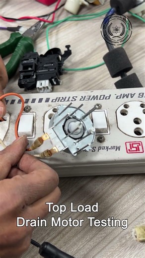Students learning Top Load Drain Motor Testing at Ktevt.