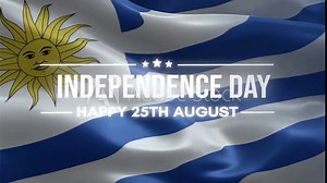 Uruguay Independence Day. Happy 25th August. \Uruguay waving flag background and fireworks