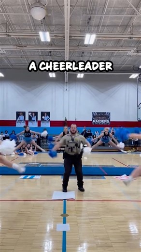 Awesome Cop Makes The Crowd Go Wild! 😂 🎥: highschooltvglobalfest TT #CopHumor #CoolCop #CheerLeader #Comedy #Reels | CopHumor_