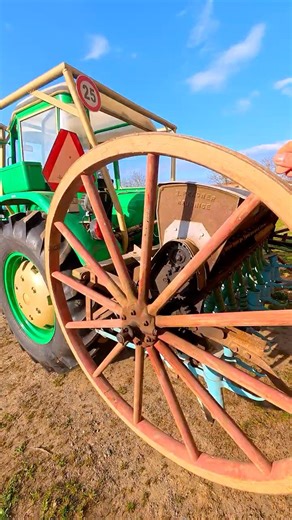 Zetor 4511 and a historic seed drill