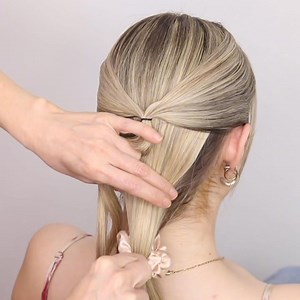 Just tried this slicked-back bow braided updo and it’s giving major prom energy! So simple, so unique, and totally elegant. Who else is rocking something fun like this for prom night? 🎀✨ | Sweethearts Hair
