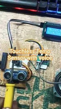 Touchless temperature sensor with voice