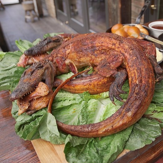 12M views · 50K reactions | Chicago's Frontier is making a splash with whole smoked alligator!  Craving more food content? Follow Localish Food! | Localish | Facebook