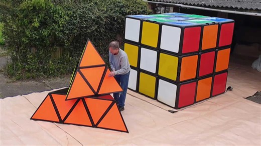 Puzzle guru makes 'world's largest pyramid puzzle' weighing 22kg