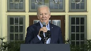 How could the midterm election outcome impact Biden's agenda