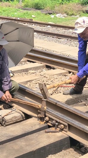 Rail track emergency repair - dog spike setting in progress. #shorts #railwaywork #foryou