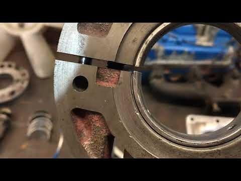 Shimming engine bearing inserts with a soda can