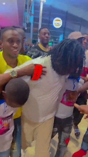 Group Dance Moves in a Bustling Indoor Event