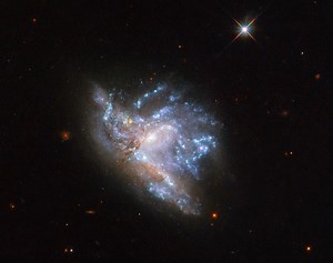Hubble Captures Image of Galaxies Colliding 230 Million Light Years Away