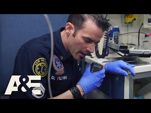 Nightwatch: Dan Helps Gunshot Victim to Stay Awake (S2 Flashback) | A&E
