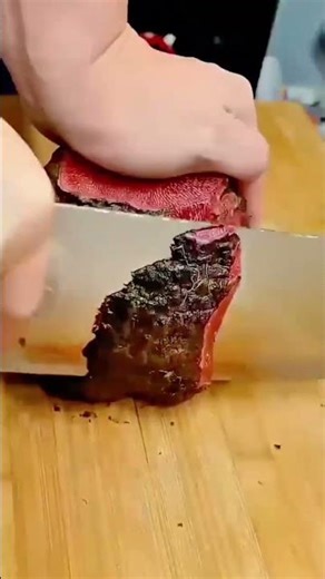 cutting fresh avocado fruit into slices using a sharp large kitchen knife #shorts