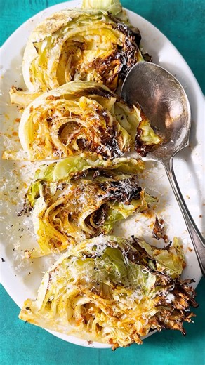Made with garlic, onion, and tangy Dijon mustard, this Air Fryer Cabbage recipe is a quick, cheap, and easy dinner. The crispy cabbage wedges are ready to eat in just 20 minutes thanks to your air fryer! | Live Eat Learn