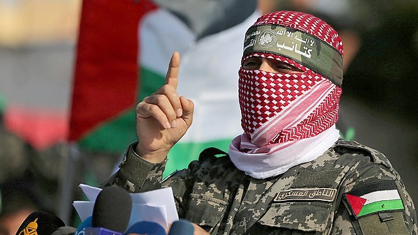 Suspected Hamas operatives loot truck delivering aid to Gazans
